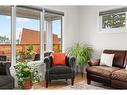 744 Mapleton Drive Se, Calgary, AB  - Indoor Photo Showing Living Room 