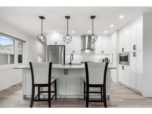 744 Mapleton Drive Se, Calgary, AB - Indoor Photo Showing Kitchen With Upgraded Kitchen