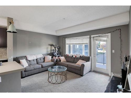 141-23 Millrise Drive Sw, Calgary, AB - Indoor Photo Showing Living Room