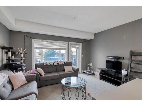 141-23 Millrise Drive Sw, Calgary, AB - Indoor Photo Showing Living Room