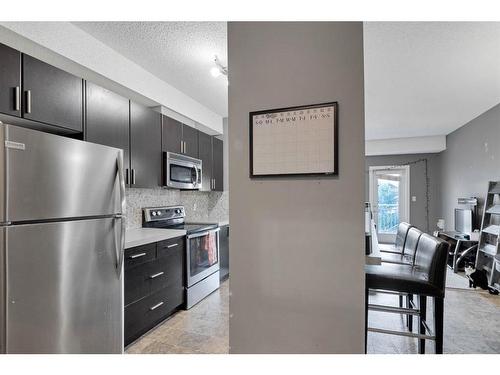 141-23 Millrise Drive Sw, Calgary, AB - Indoor Photo Showing Kitchen With Stainless Steel Kitchen