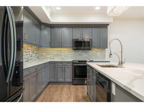 283185 Serenity Place, Rural Rocky View County, AB - Indoor Photo Showing Kitchen With Upgraded Kitchen