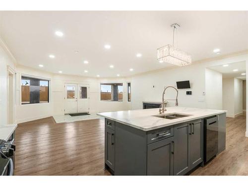 283185 Serenity Place, Rural Rocky View County, AB - Indoor Photo Showing Kitchen With Double Sink