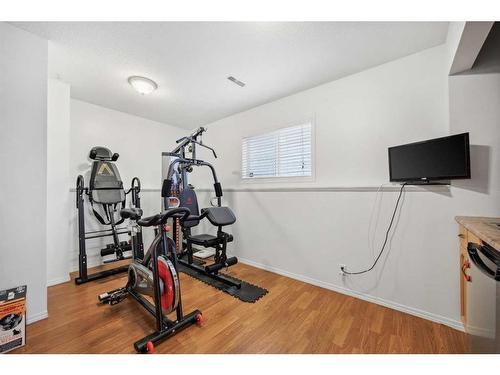 7 Silver Creek Boulevard Nw, Airdrie, AB - Indoor Photo Showing Gym Room