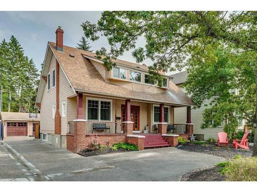 4002 Elbow Drive Sw, Calgary, AB - Outdoor With Deck Patio Veranda With Facade