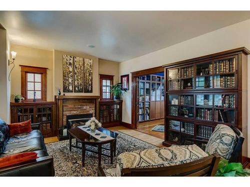 4002 Elbow Drive Sw, Calgary, AB - Indoor Photo Showing Living Room With Fireplace