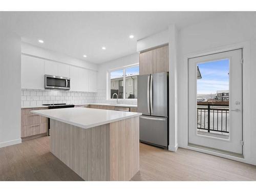 #212-857 Belmont Drive Sw, Calgary, AB - Indoor Photo Showing Kitchen With Upgraded Kitchen