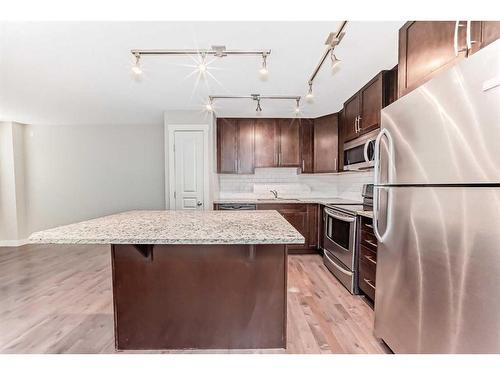 705 Mckenzie Towne Square Se, Calgary, AB - Indoor Photo Showing Kitchen With Upgraded Kitchen