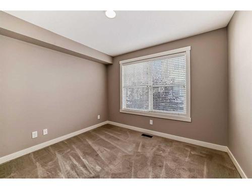 705 Mckenzie Towne Square Se, Calgary, AB - Indoor Photo Showing Other Room