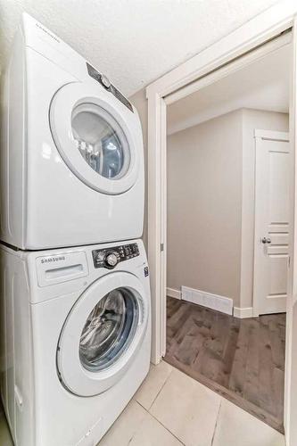 705 Mckenzie Towne Square Se, Calgary, AB - Indoor Photo Showing Laundry Room