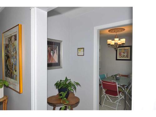 223 31 Avenue Ne, Calgary, AB - Indoor Photo Showing Living Room With Fireplace