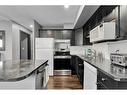 G1-835 19 Avenue Sw, Calgary, AB  - Indoor Photo Showing Kitchen With Double Sink 