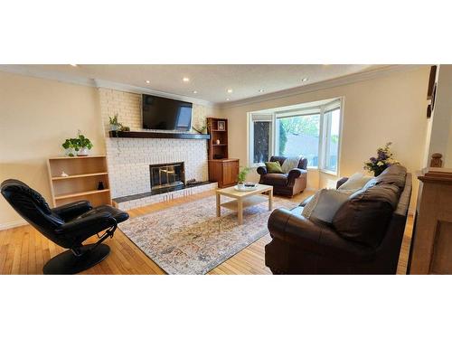 195 Becker Crescent, Fort Mcmurray, AB - Indoor Photo Showing Living Room With Fireplace