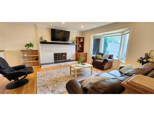 195 Becker Crescent, Fort Mcmurray, AB - Indoor Photo Showing Living Room With Fireplace