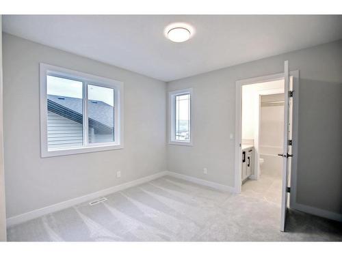 44 Precedence View, Cochrane, AB - Indoor Photo Showing Other Room