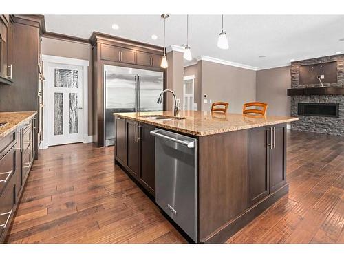 820 Coopers Square Sw, Airdrie, AB - Indoor Photo Showing Kitchen With Upgraded Kitchen