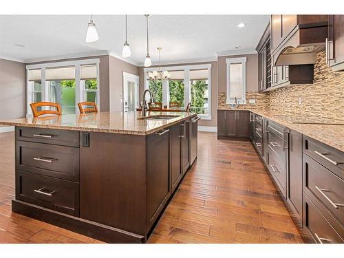 820 Coopers Square Sw, Airdrie, AB - Indoor Photo Showing Kitchen With Upgraded Kitchen