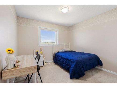 10063 Hidden Valley Drive Nw, Calgary, AB - Indoor Photo Showing Bedroom