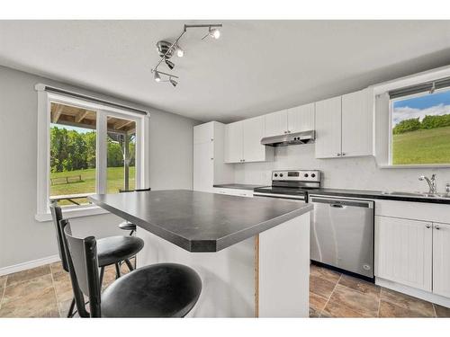 4441 Township Road 312, Rural Mountain View County, AB - Indoor Photo Showing Kitchen With Stainless Steel Kitchen