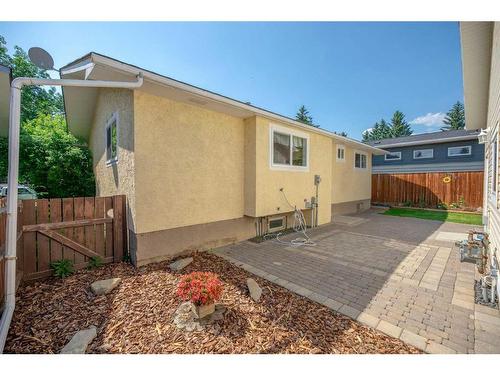 112 Baird Avenue, Cochrane, AB - Outdoor With Deck Patio Veranda With Exterior