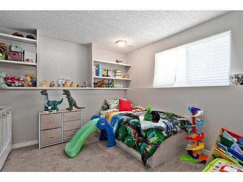 163 Wood Crest Place Sw, Calgary, AB - Indoor Photo Showing Bedroom