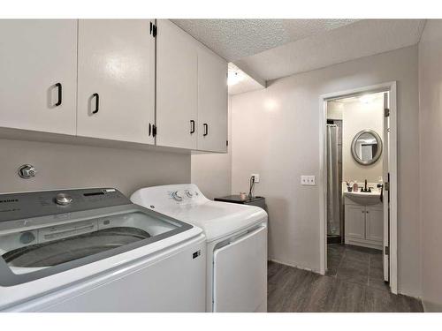 163 Wood Crest Place Sw, Calgary, AB - Indoor Photo Showing Laundry Room