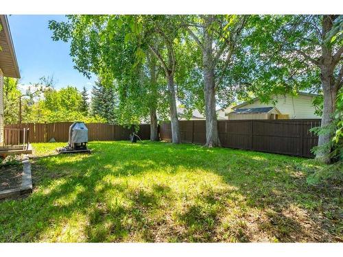163 Wood Crest Place Sw, Calgary, AB - Outdoor With Backyard
