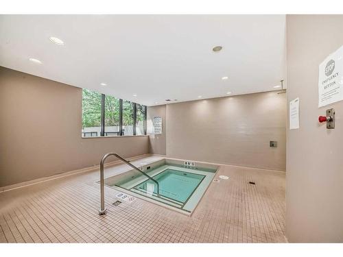 604-128 2 Street Sw, Calgary, AB - Indoor Photo Showing Other Room With In Ground Pool