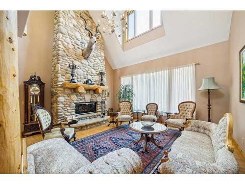 3 Woodlands Estates Crescent, Rural Rocky View County, AB - Indoor Photo Showing Living Room With Fireplace