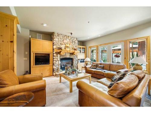 3 Woodlands Estates Crescent, Rural Rocky View County, AB - Indoor Photo Showing Living Room With Fireplace