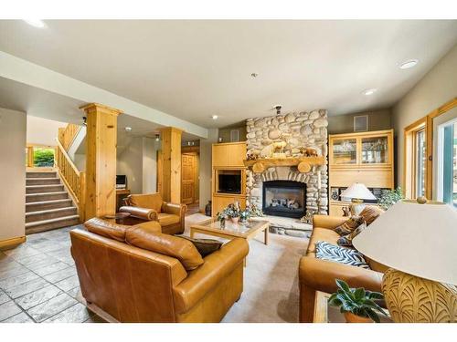 3 Woodlands Estates Crescent, Rural Rocky View County, AB - Indoor Photo Showing Living Room With Fireplace