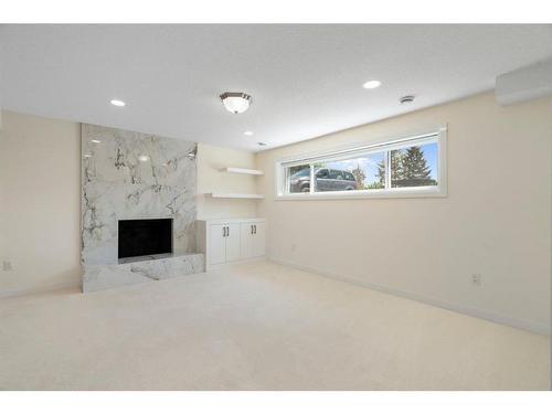 108 Rundlefield Close Ne, Calgary, AB - Indoor With Fireplace