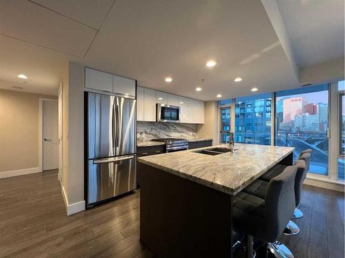 306-510 6 Avenue Se, Calgary, AB - Indoor Photo Showing Kitchen With Stainless Steel Kitchen With Double Sink With Upgraded Kitchen