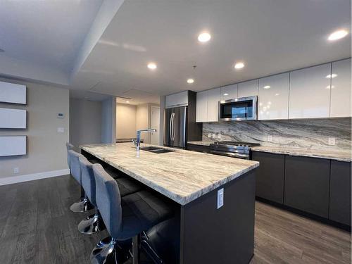 306-510 6 Avenue Se, Calgary, AB - Indoor Photo Showing Kitchen With Double Sink With Upgraded Kitchen