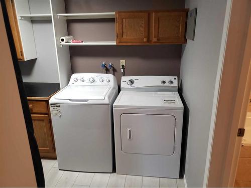 1-1603 16 Avenue Sw, Calgary, AB - Indoor Photo Showing Laundry Room