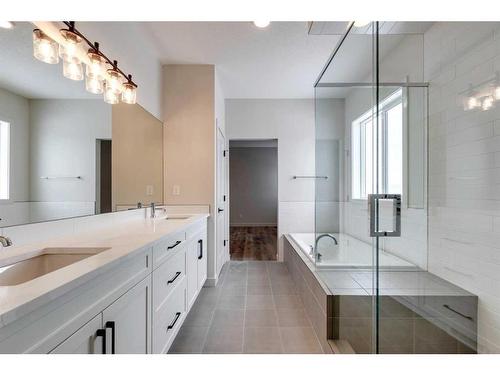 569 Rivercrest View, Cochrane, AB - Indoor Photo Showing Bathroom