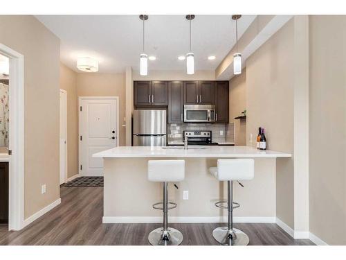 318-10 Mahogany Mews Se, Calgary, AB - Indoor Photo Showing Kitchen With Stainless Steel Kitchen With Upgraded Kitchen