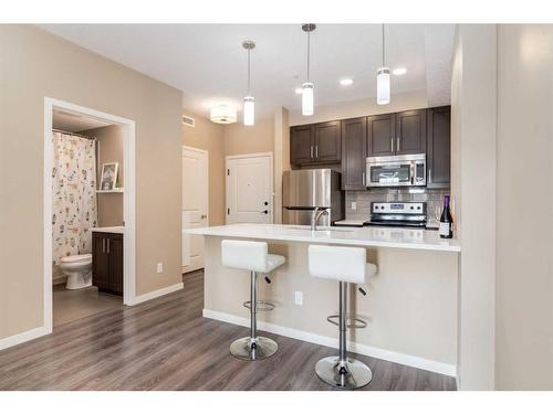 318-10 Mahogany Mews Se, Calgary, AB - Indoor Photo Showing Kitchen With Stainless Steel Kitchen With Upgraded Kitchen