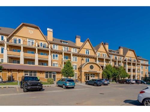 318-10 Mahogany Mews Se, Calgary, AB - Outdoor With Balcony With Facade