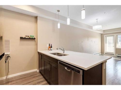 318-10 Mahogany Mews Se, Calgary, AB - Indoor Photo Showing Kitchen With Double Sink