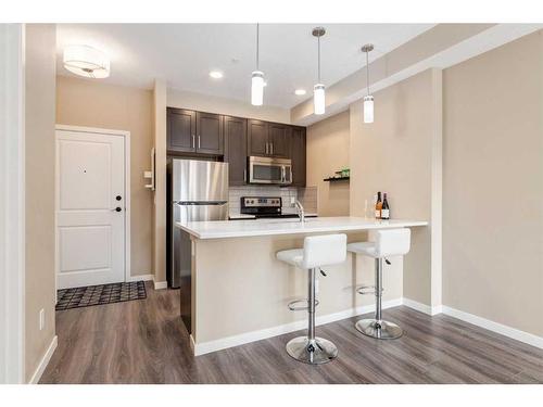 318-10 Mahogany Mews Se, Calgary, AB - Indoor Photo Showing Kitchen With Stainless Steel Kitchen With Upgraded Kitchen