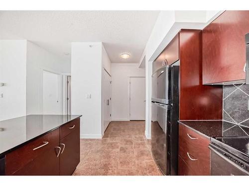 1701-8880 Horton Road Sw, Calgary, AB - Indoor Photo Showing Kitchen