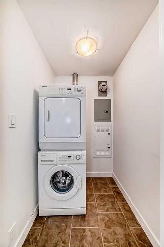 1701-8880 Horton Road Sw, Calgary, AB - Indoor Photo Showing Laundry Room