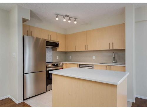 1114-1111 6 Avenue Sw, Calgary, AB - Indoor Photo Showing Kitchen With Stainless Steel Kitchen