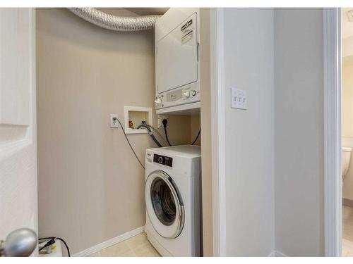 1114-1111 6 Avenue Sw, Calgary, AB - Indoor Photo Showing Laundry Room