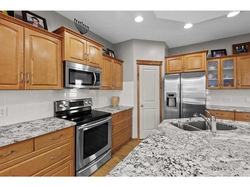 135 Chapman Circle Se, Calgary, AB - Indoor Photo Showing Kitchen With Stainless Steel Kitchen With Double Sink