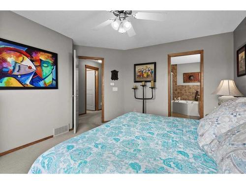 135 Chapman Circle Se, Calgary, AB - Indoor Photo Showing Bedroom