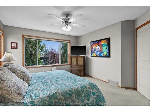 135 Chapman Circle Se, Calgary, AB - Indoor Photo Showing Bedroom