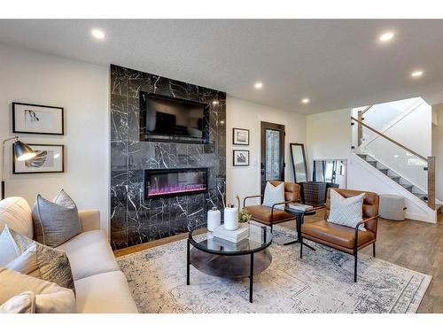 2126 18A Street Sw, Calgary, AB - Indoor Photo Showing Living Room With Fireplace