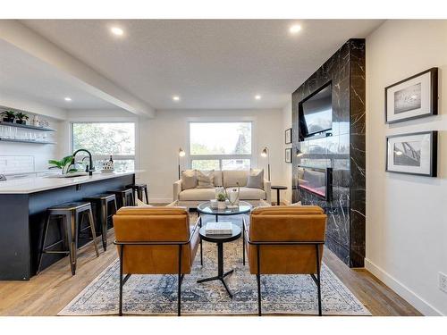 2126 18A Street Sw, Calgary, AB - Indoor Photo Showing Living Room With Fireplace